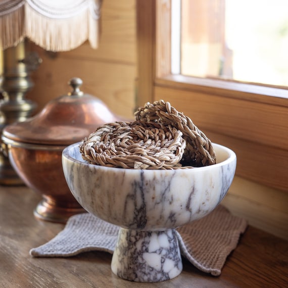 Discover Elegant Bowls with Marbles on a Shaker Table for Your Home